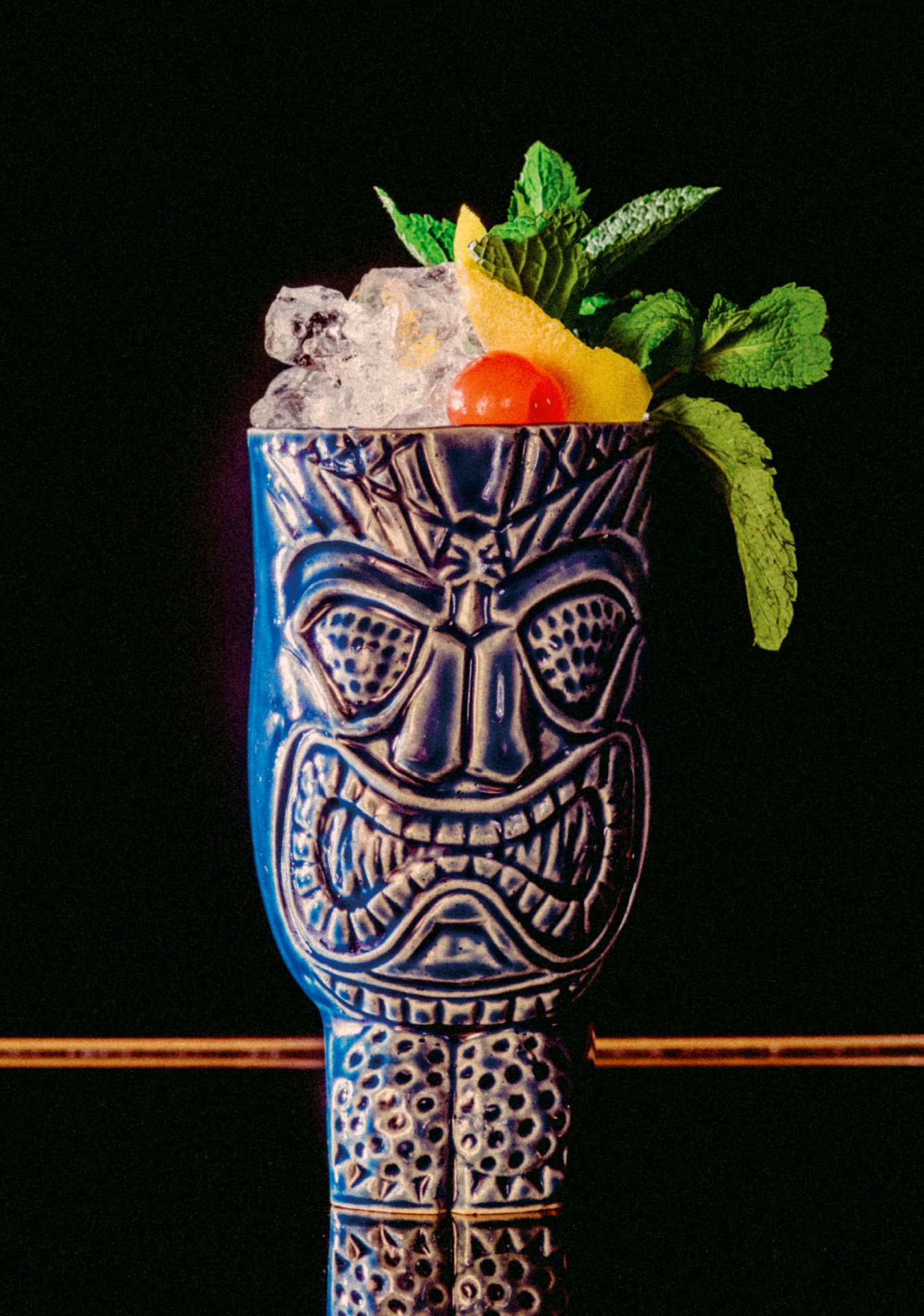 Recipe: 2cl Havana Club Añejo 7 Años 2cl Havana Club Añejo 3 Años 2cl Wray & Nephew 1cl Goslings Black Seal 2cl Lime Juice 1.5cl Cointreau 1.5cl Orgeat Syrup